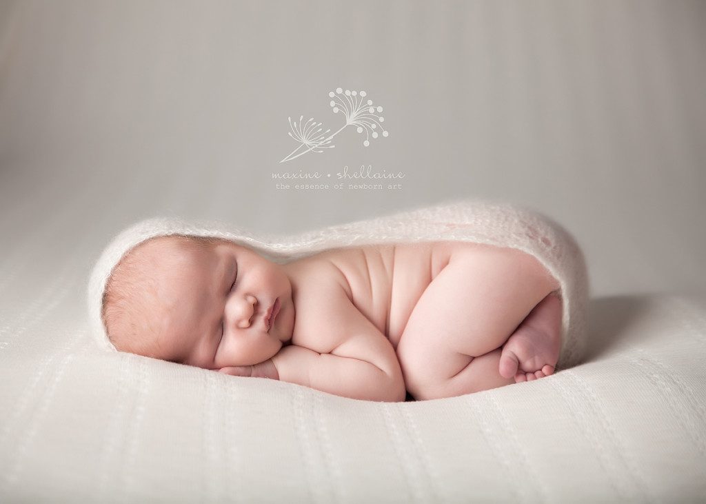 alt=Best Edmonton Newborn Photographer, alt=baby sleeping on white blanket
