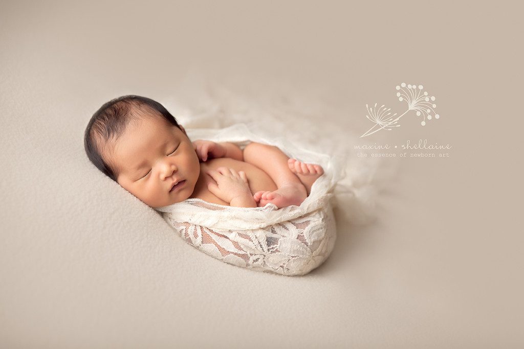 alt=Edmonton newborn photographer, alt=sleeping newborn girl, alt=high key newborn images