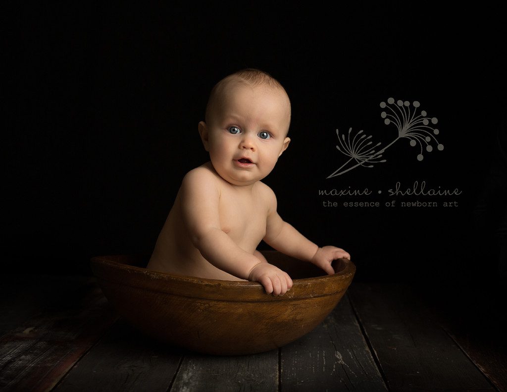 alt=edmonton baby photographer, alt=older baby in bowl, alt=7 month baby picture, alt=7 month boy