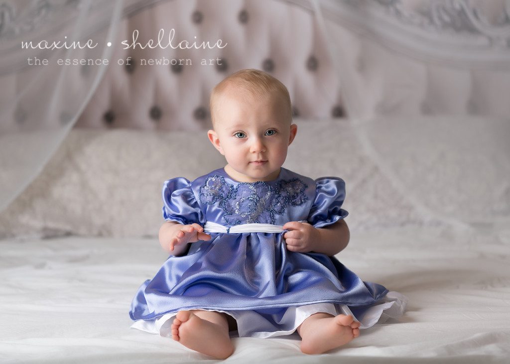 Alt=One Year Old Cakesmash, Alt=Best Edmonton Newborn Photographer, Alt=Cute Baby on Baby, Alt=Pretty Girl in Purple Dress
