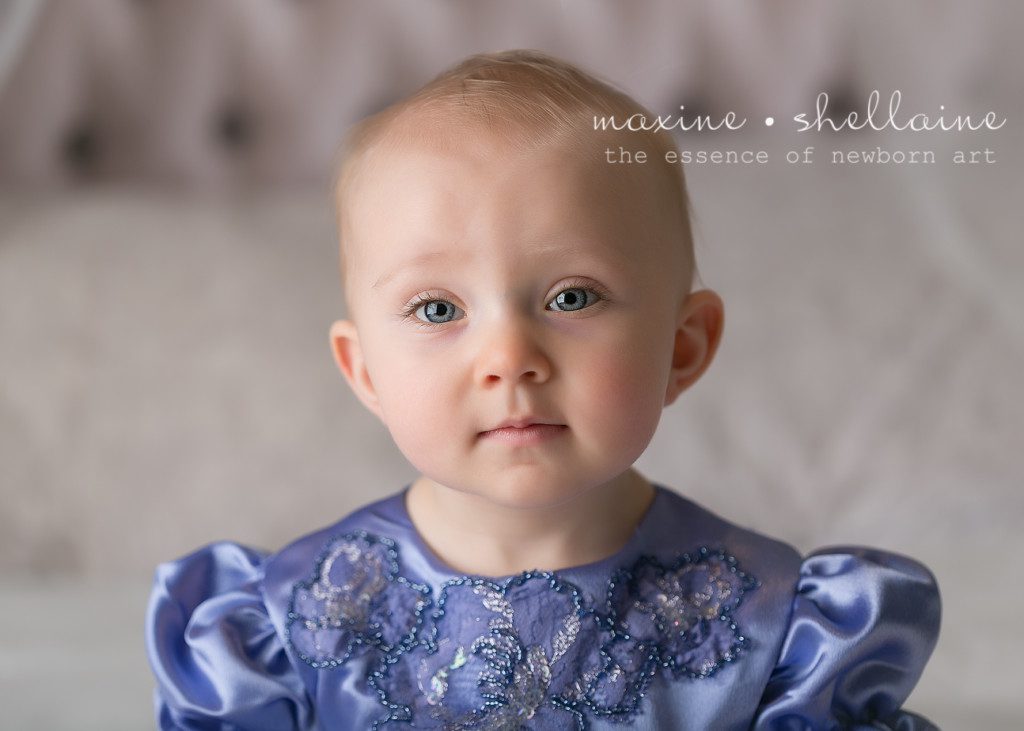 Alt=One Year Old Cakesmash, Alt=Best Edmonton Newborn Photographer, Alt=Cute Baby on Baby, Alt=Pretty Girl in Purple Dress