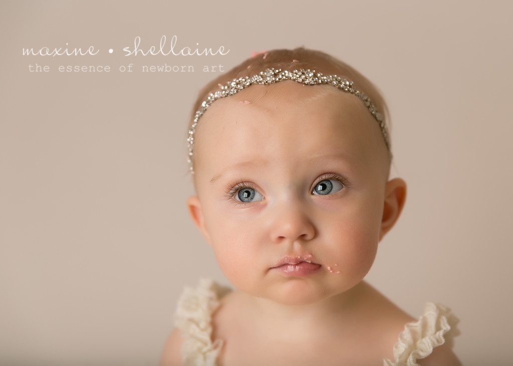 Alt=One Year Old Cakesmash, Alt=Best Edmonton Newborn Photographer, Alt=Cute Baby on Cream Background, Alt=Pretty Girl in Cream Dress