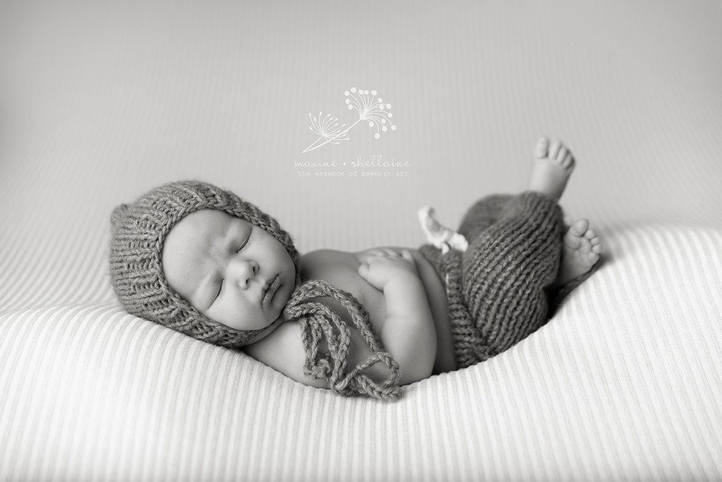 alt=black and white newborn photography