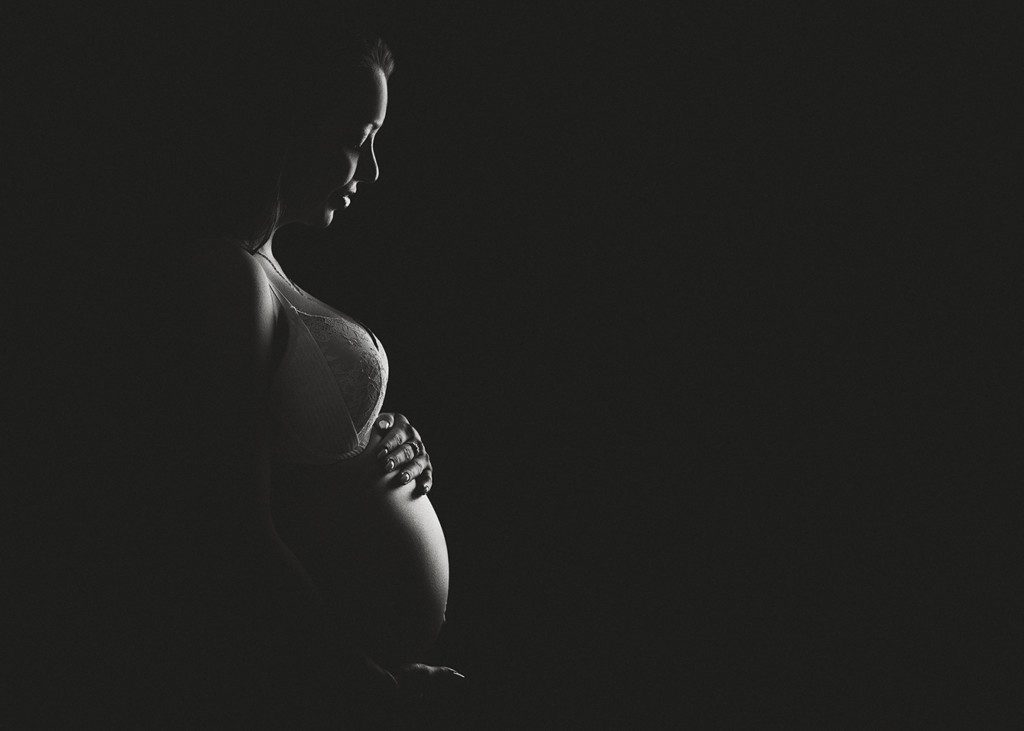 alt=Silhouette maternity photography in Edmonton, alt=light and airy studio space, alt=Edmonton maternity photographers, alt=black and white silhouette maternity portraits